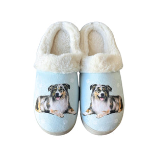 a pair of slippers with a picture of a dog on it