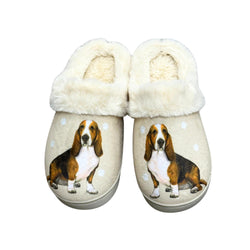 a pair of slippers with a dog on them