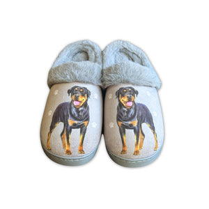 a pair of slippers with a picture of a dog on them