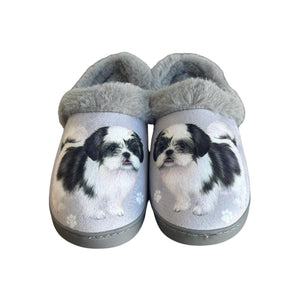 a pair of slippers with a picture of a dog on them