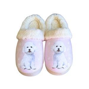 a pair of slippers with a white dog on them