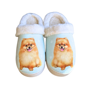 a pair of slippers with a picture of a dog on it