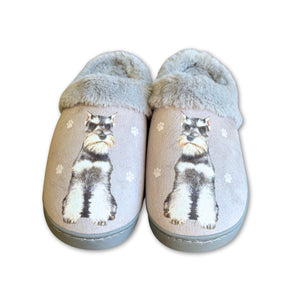 a pair of slippers with a cat on them