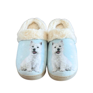 a pair of blue slippers with a white dog on it